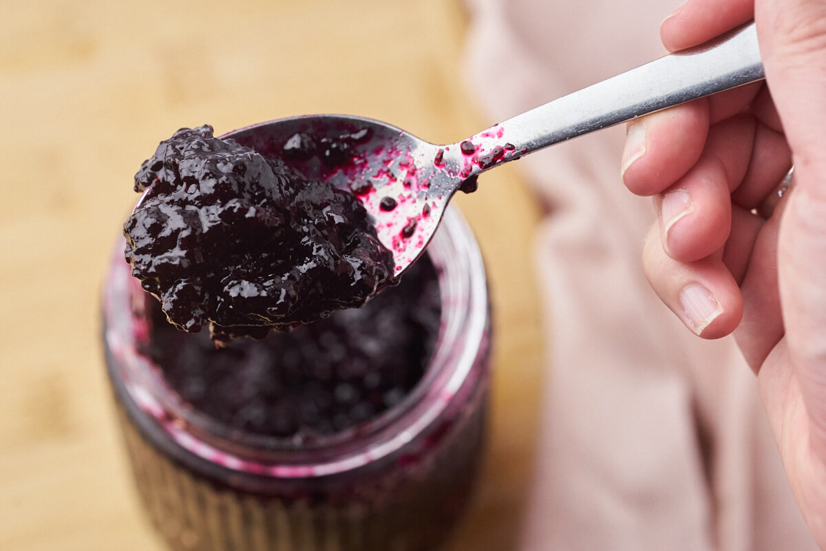 blueberry compote on a spoon so you can see the consistency.