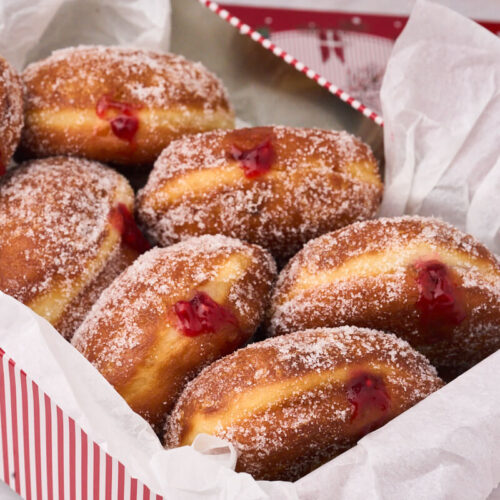 Berliner Pfannkuchen with raspberry jam in a christmas box.